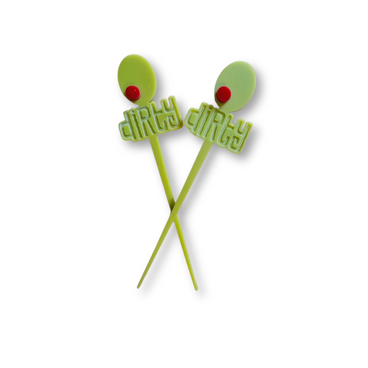Two cocktail picks with an olive design and the word dirty engraved in them
